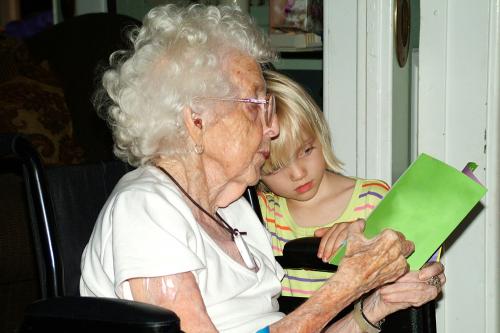 reading-with-grandmother-in-wheelchair-1432646